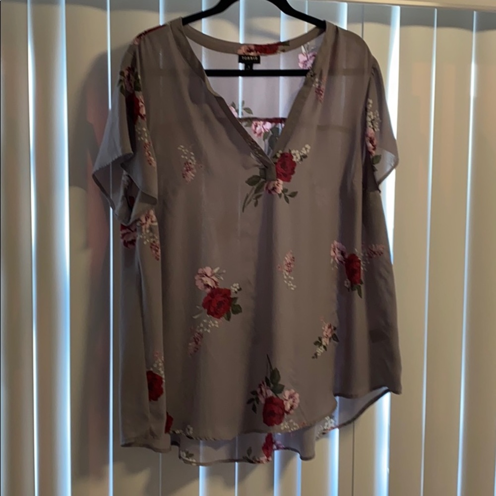 Sheer purple blouse with flower print